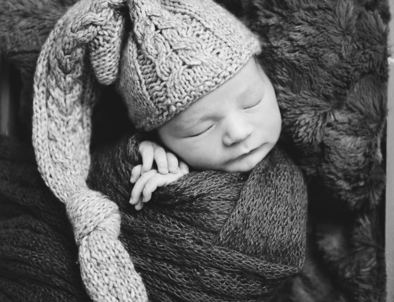 Cute child sleeping in hat, closeup