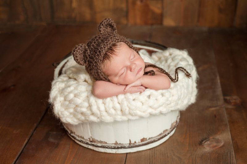 Newborn Baby Boy Wearing a Bear Hat